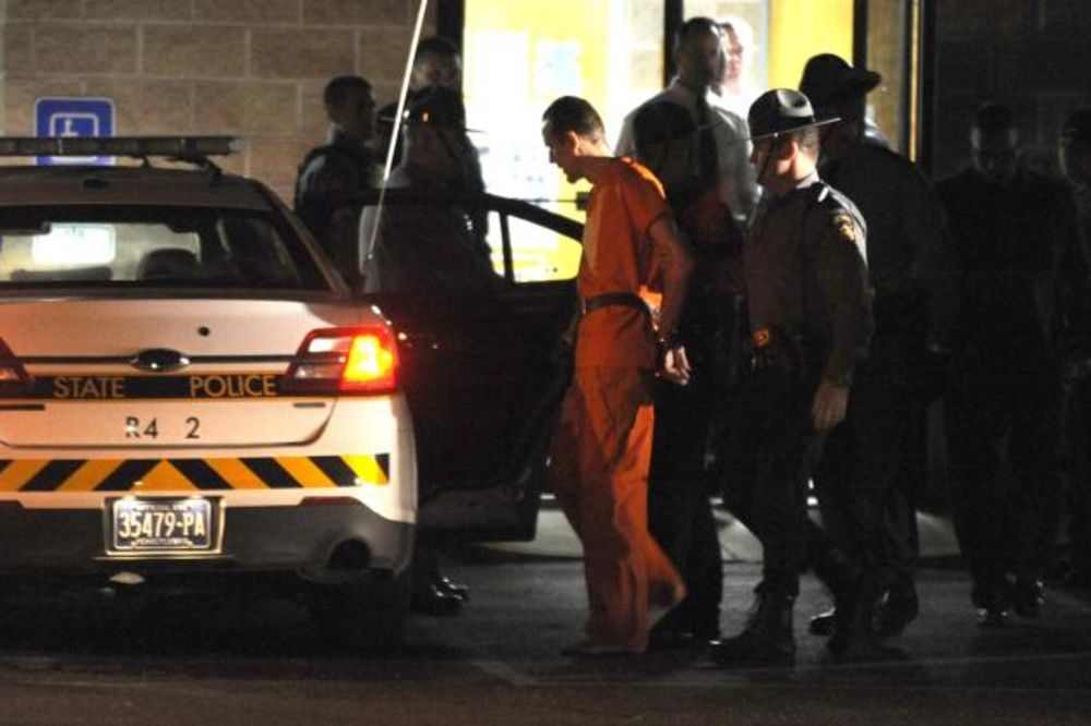 Erik Frejn je doveden u policijsku stanicu uz neviđene mere bezbednosti (Foto: AP)